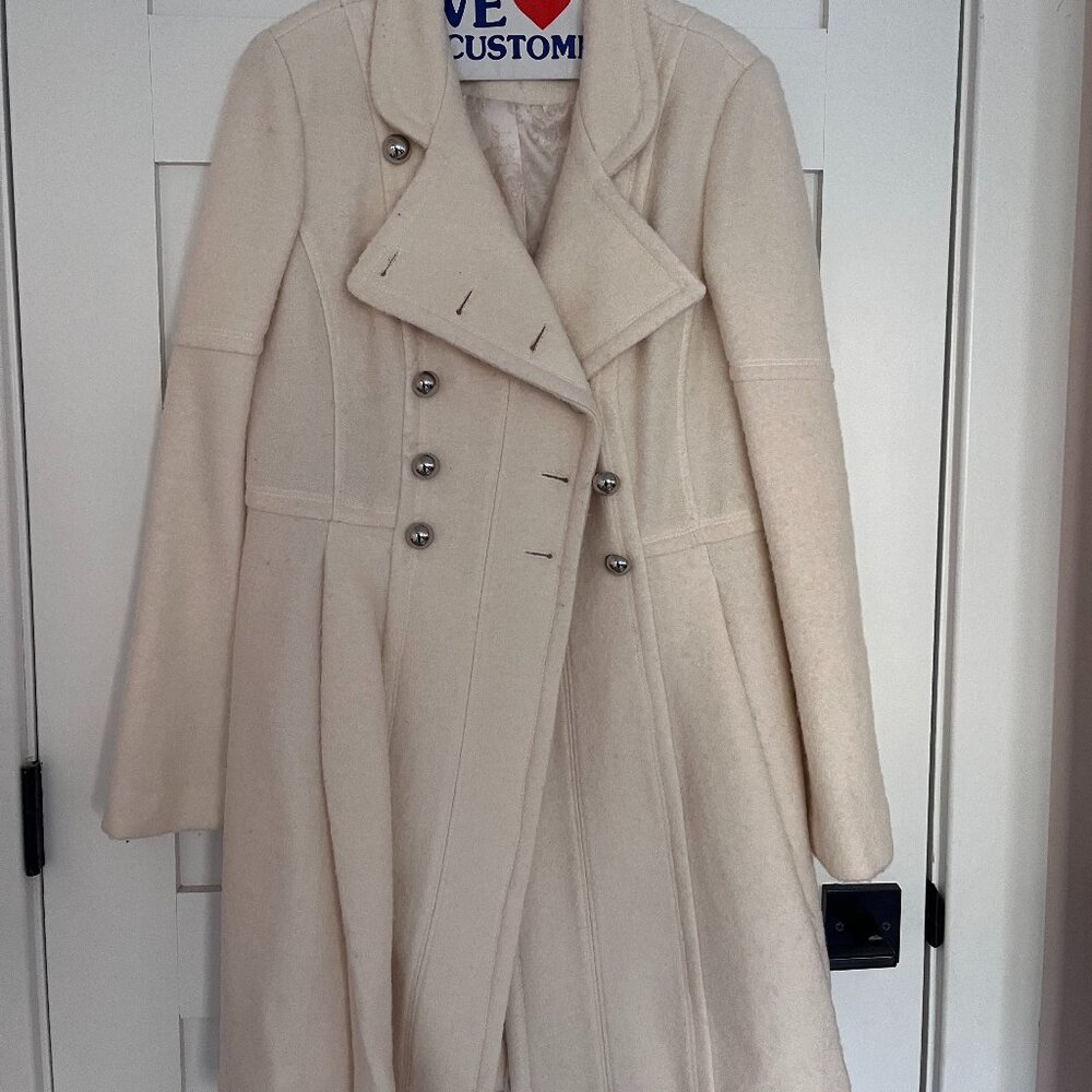 Double-Breasted Peplum Coat In Cream